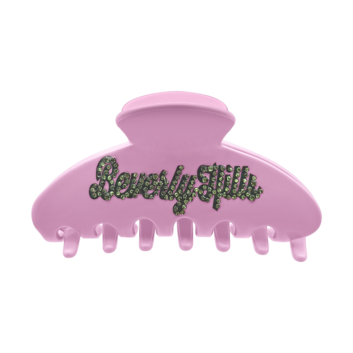 Pink claw clip with green rhinestone “Beverly Hills” lettering on the front.