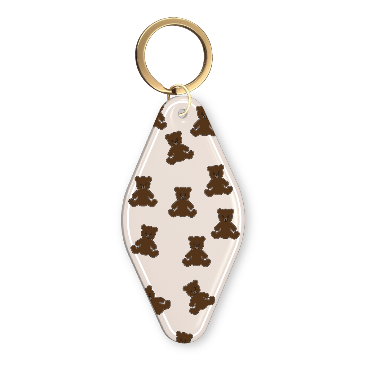 Beige acrylic motel-style keychain with an all-over brown teddy bear pattern and gold keyring.