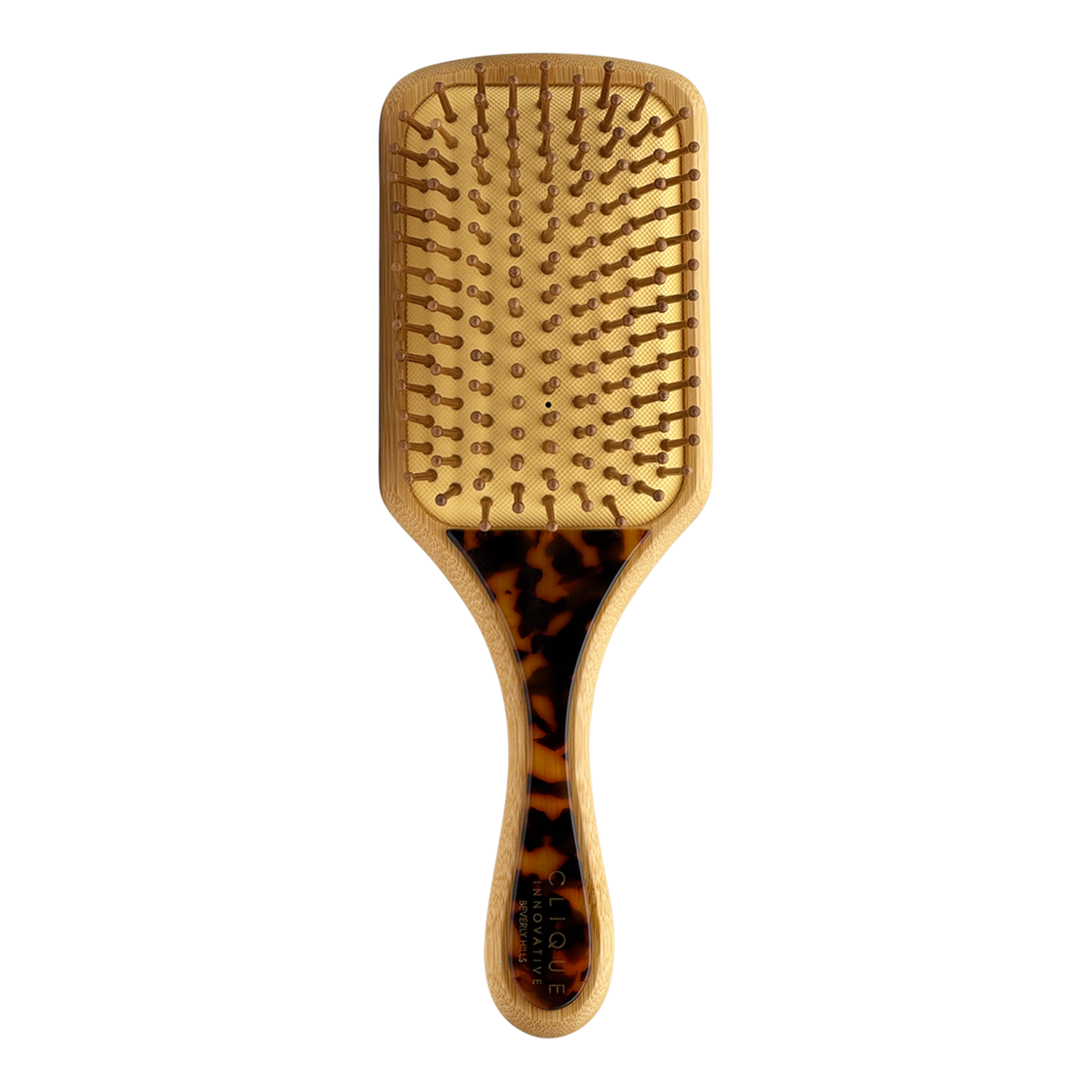 Back view of a classic tortoise paddle hairbrush with bamboo body and bristles.