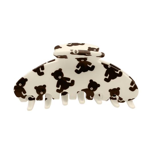 Front view of a beige claw clip with an all-over brown teddy bear design.