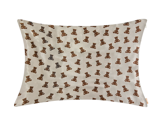 Beige satin pillowcase with an all-over brown teddy bear print.
