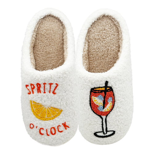 White slippers with embroidered text 'Spritz O’Clock' and an orange slice design on one slipper, and a colorful spritz cocktail glass on the other, on a white background.