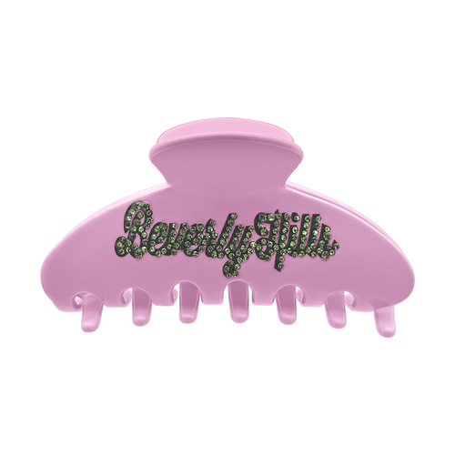Pink claw clip with green rhinestone “Beverly Hills” lettering on the front.