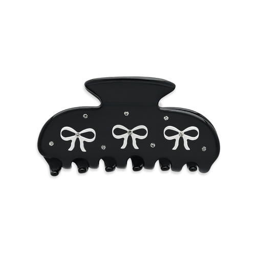 Front view of a black claw clip with three white bow graphics and silver rhinestones on a white background.