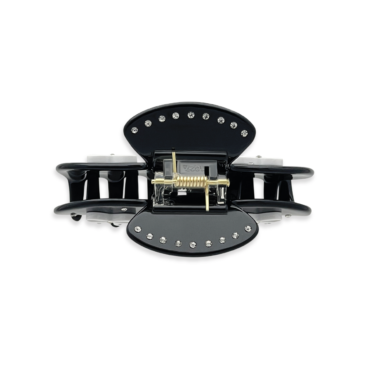 Top view of a black claw clip with silver rhinestones outlining the top edges and a visible gold spring mechanism on a white background.