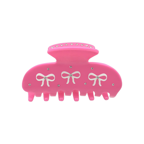 Front view of a hot pink claw clip with three white bow graphics and silver rhinestones on a white background.