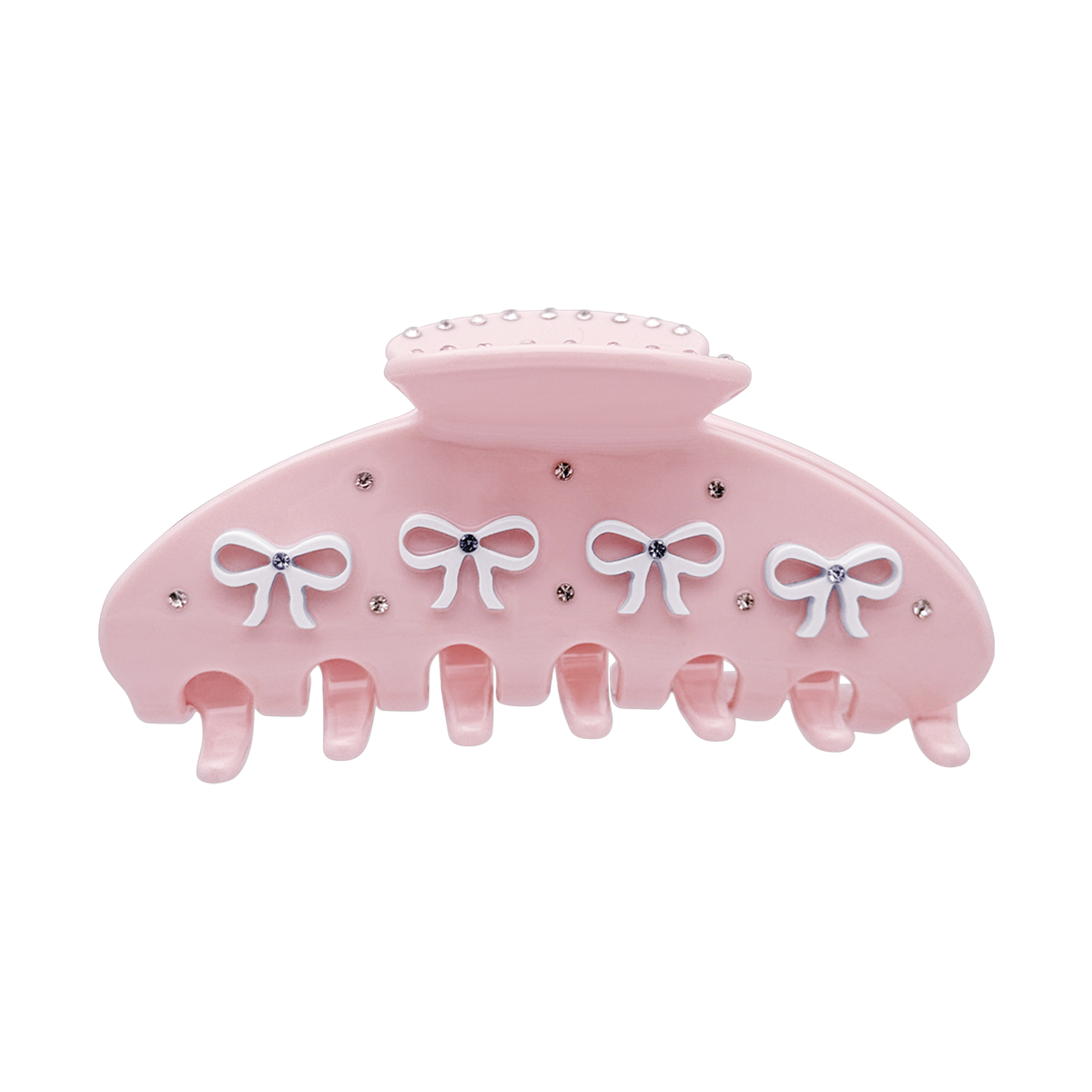 Front view of a pink claw clip with white bow designs and rhinestone accents