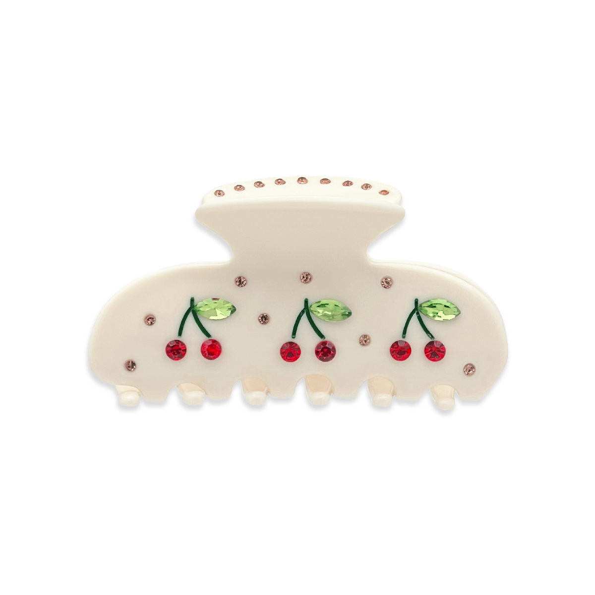 Front view of a beige claw clip with red cherry graphics with red rhinestones, green leaf accents with green rhinestones, and small gold rhinestones throughout and on the top, on a white background.