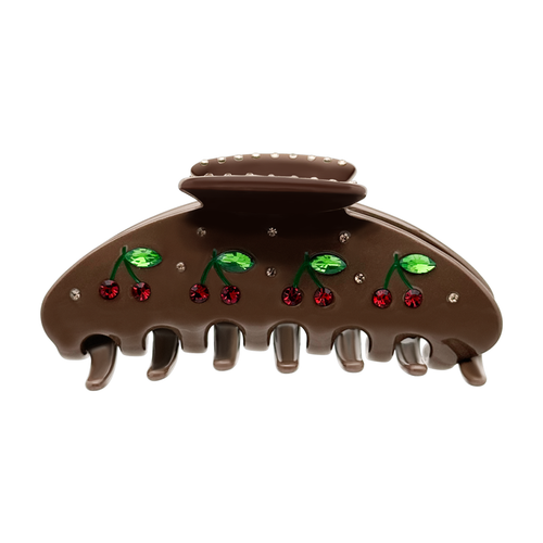 Front view of a brown claw clip with red cherry and green leaf rhinestone details