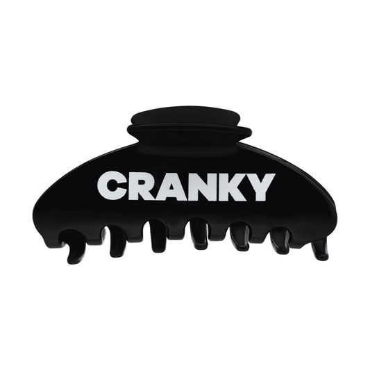 Front view of a black claw clip with bold white Cranky lettering.