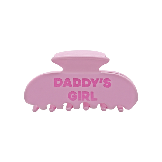 Front view of a pink claw clip with bold pink “DADDY’S GIRL” text on a white background.