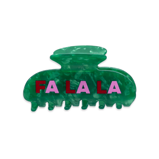 Front view of a green marble claw clip with the words “FA LA LA” printed in red and pink letters on a white background.
