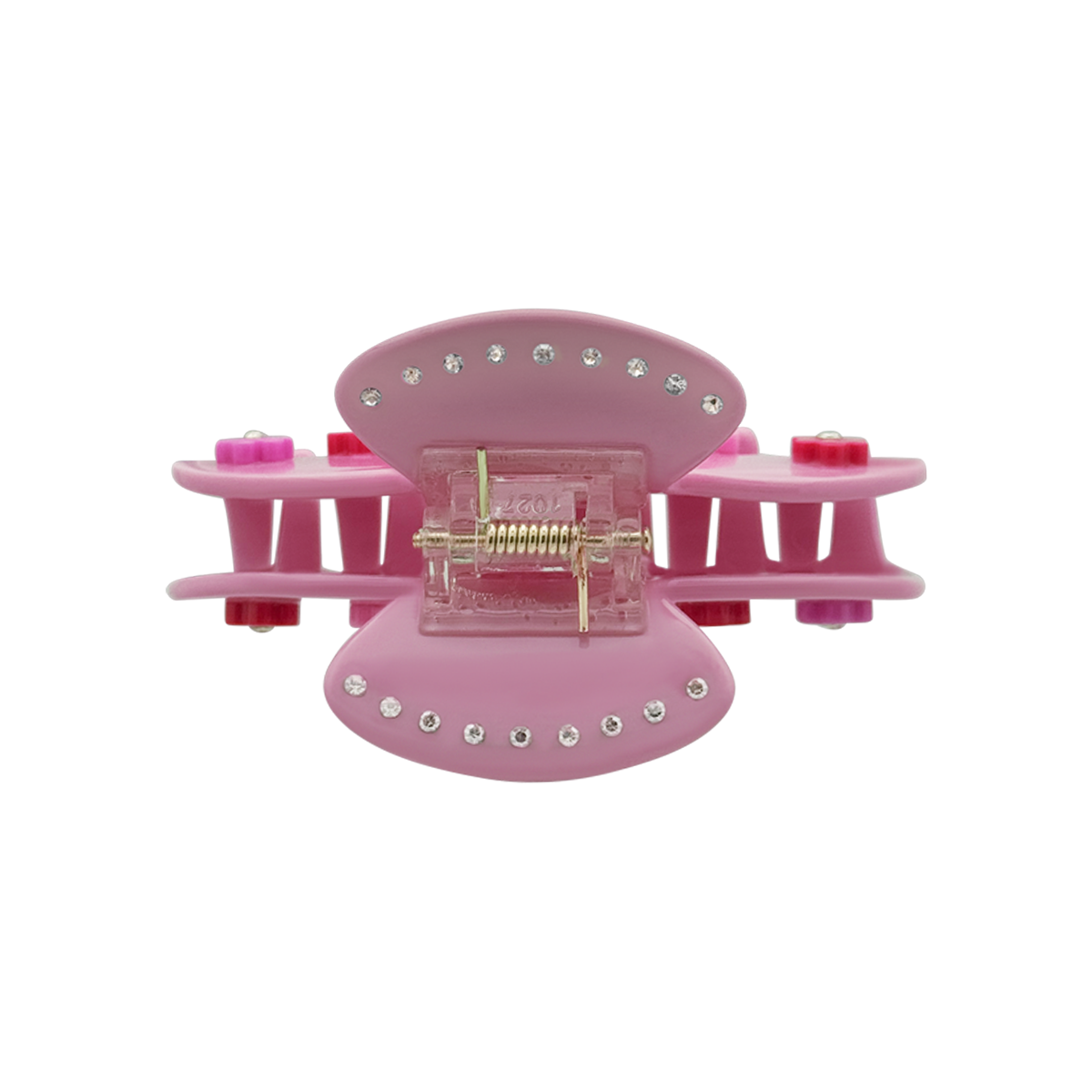 Top view of a blush pink claw clip with silver rhinestone accents arranged along the edges on a white background.