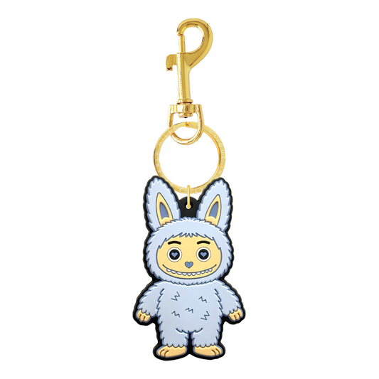 Blue fuzzy bear bag charm with gold-tone hardware