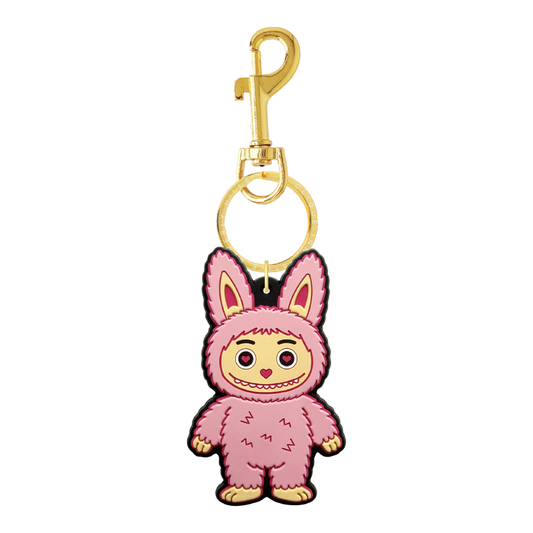 Pink fuzzy bear bag charm with gold-tone hardware