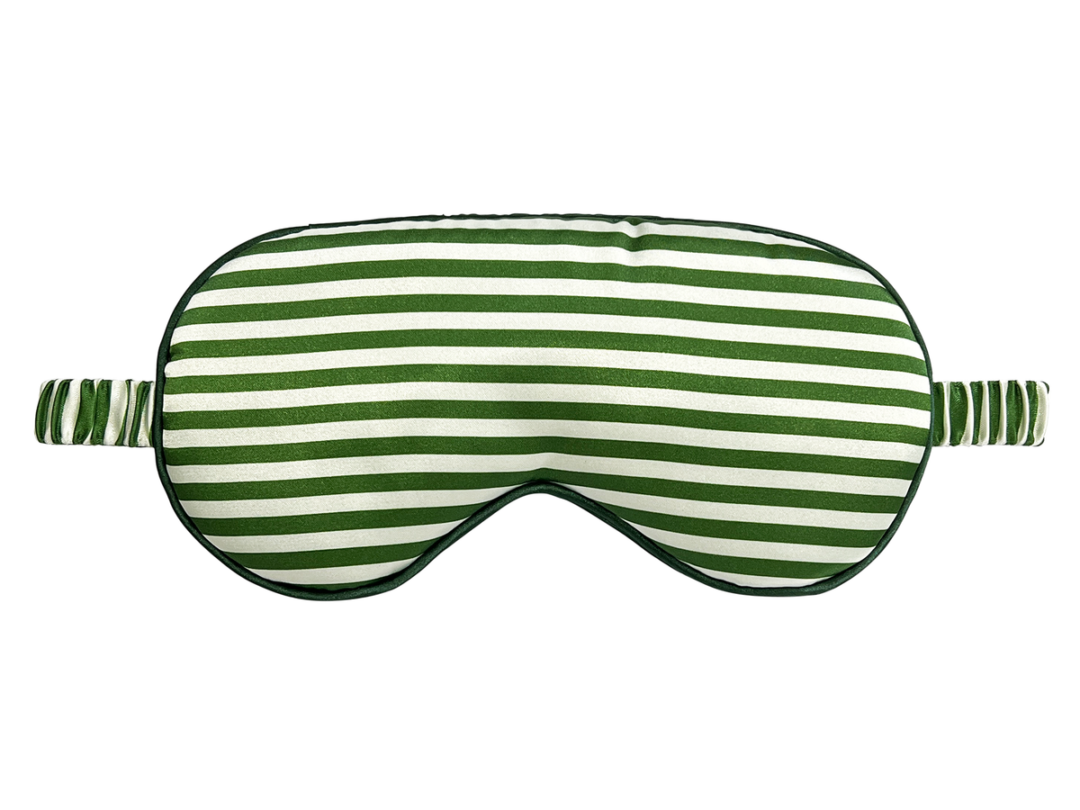 Front view of a green and white striped satin eye mask.