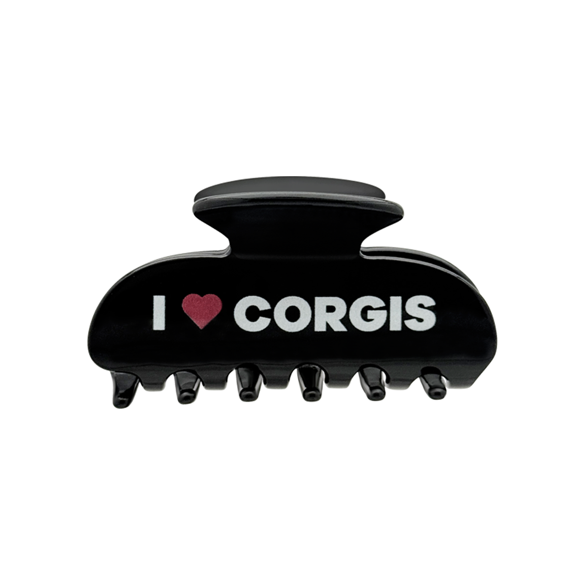 Front view of a black claw clip with white text that reads “I” followed by a red heart graphic and the word “CORGIS” on the front.