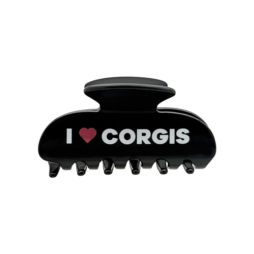 Front view of a black claw clip with white text that reads “I” followed by a red heart graphic and the word “CORGIS” on the front.