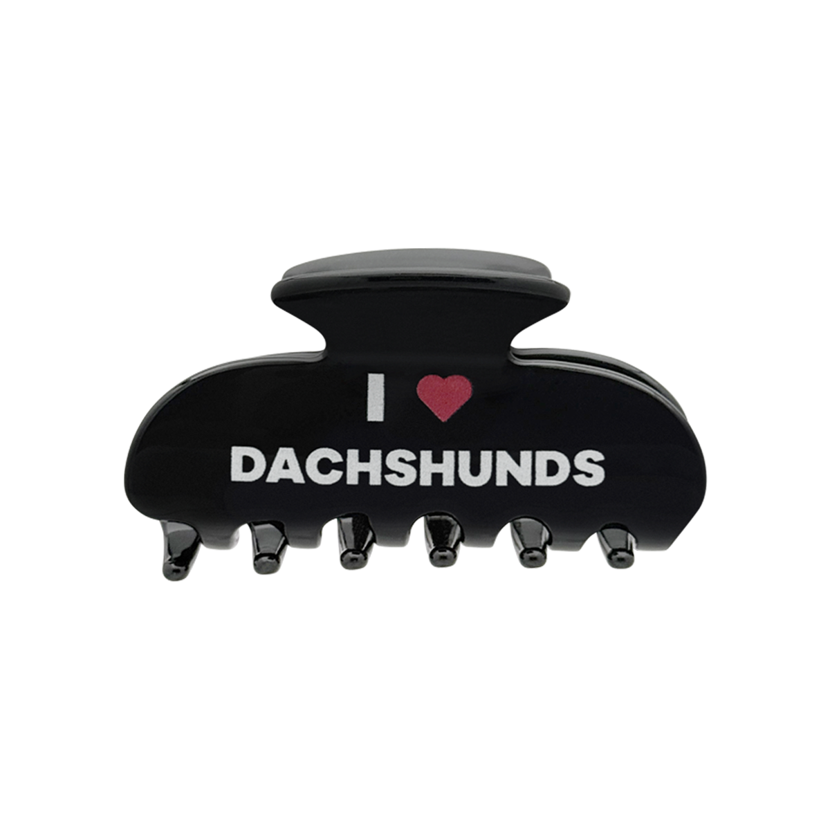 Front view of a black claw clip with white text that reads “I” followed by a red heart graphic and the word “DACHSHUNDS” on the front.