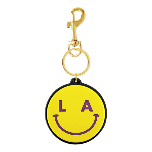 Yellow LA smiley bag charm with purple details and gold-tone hardware