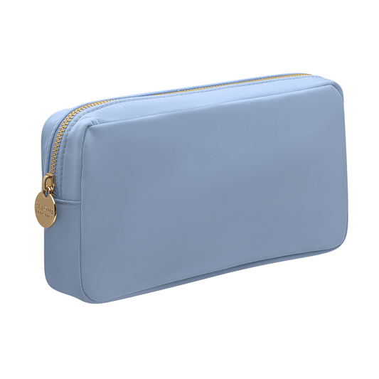 Light blue small cosmetic pouch with gold zipper and round gold zipper puller.