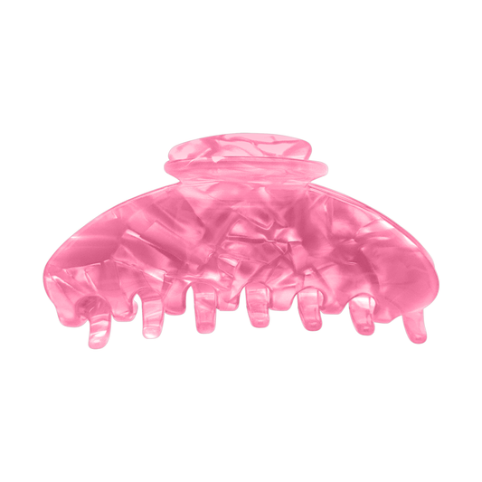 Front view of a coral pink marbled claw clip.