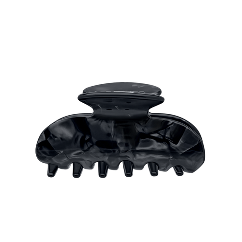 Front view of a dark onyx marbled claw clip.