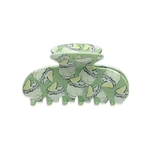 Front view of a green claw clip featuring an all-over margarita cocktail pattern with lime wedge illustrations.