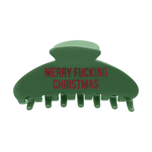 Front view of a green claw clip with bold red “MERRY FUCKING CHRISTMAS” text on the front.