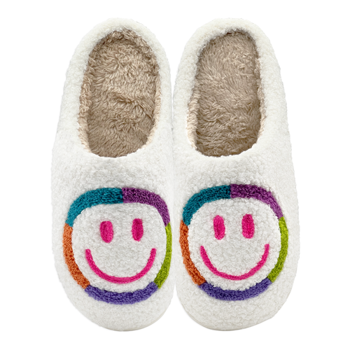 Pair of plush slippers with multicolor smiley face design on the front.