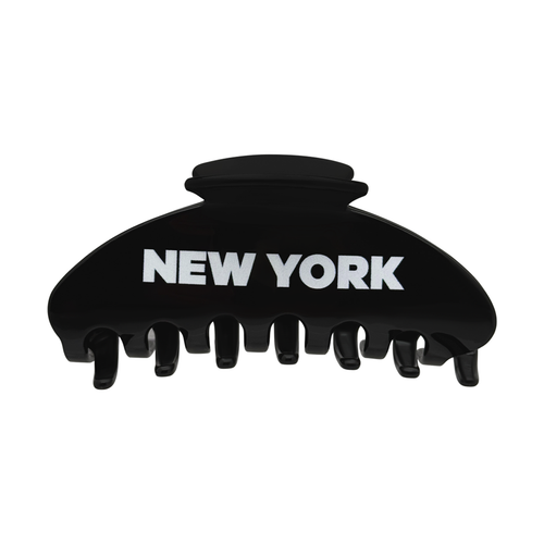 Front view of a black claw clip with bold white New York lettering.