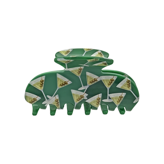Front view of a green claw clip with martini glass pattern on a white background.