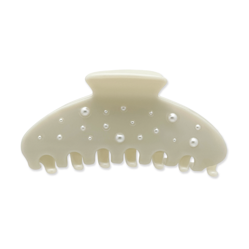 Front view of a white claw clip with scattered faux-pearl accents on a white background.