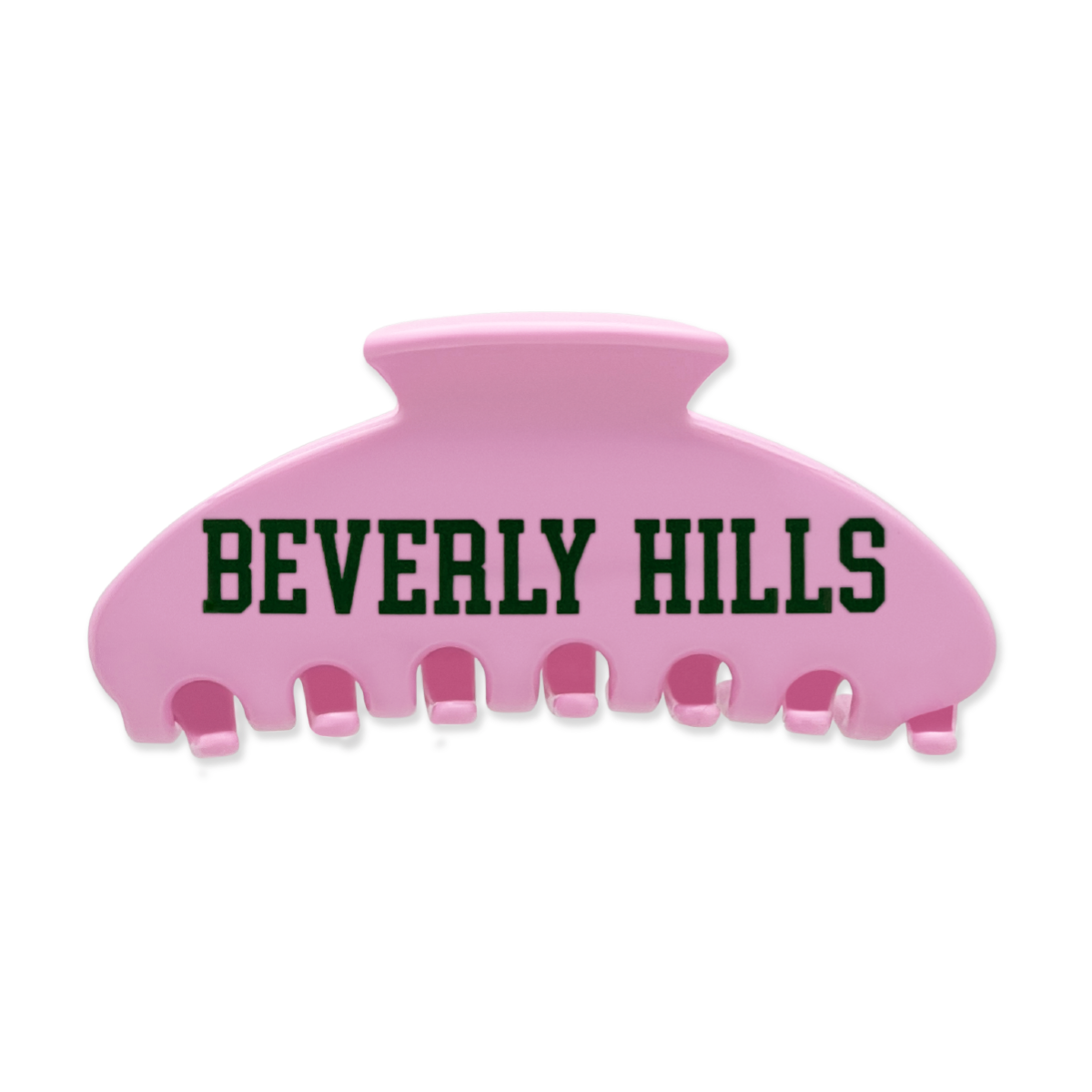 Pink claw hair clip with green “Beverly Hills” lettering on the front.