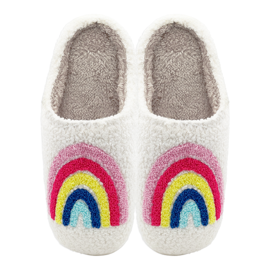 Pair of plush slippers with colorful rainbow design on the front.