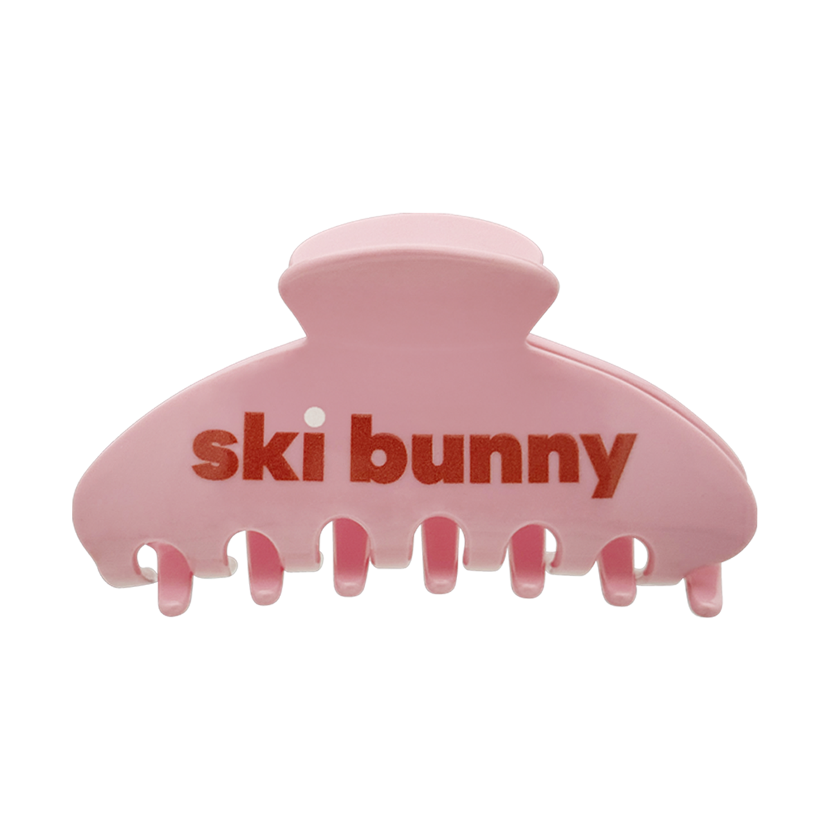 Front view of a blush pink claw clip with “ski bunny” text on a white background.