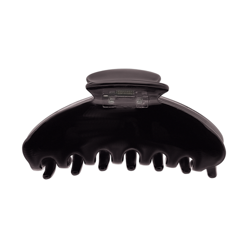 Front view of a solid grey claw clip on a white background.