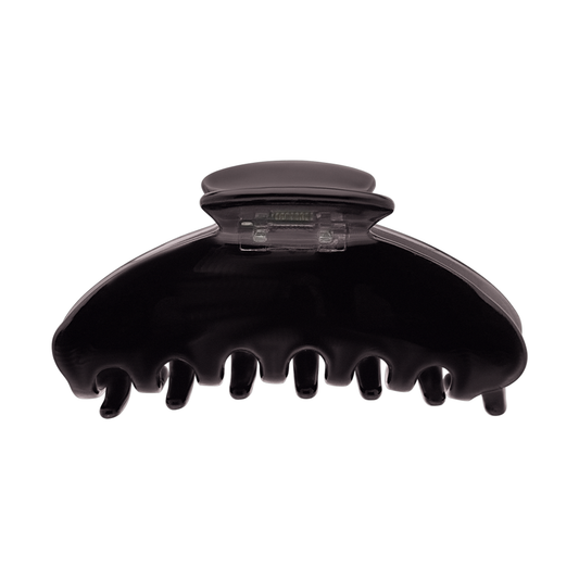 Front view of a solid grey claw clip on a white background.