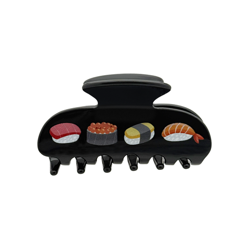 Front view of a black claw clip with sushi design on a white background.