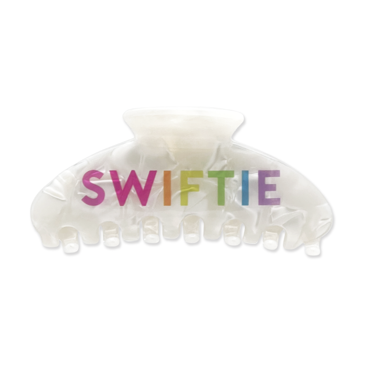 Front view of a white marble claw clip with “Swiftie” text in rainbow colors on a white background.