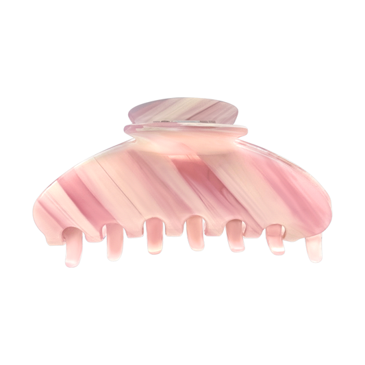 Front view of a rose beige marbled claw clip.