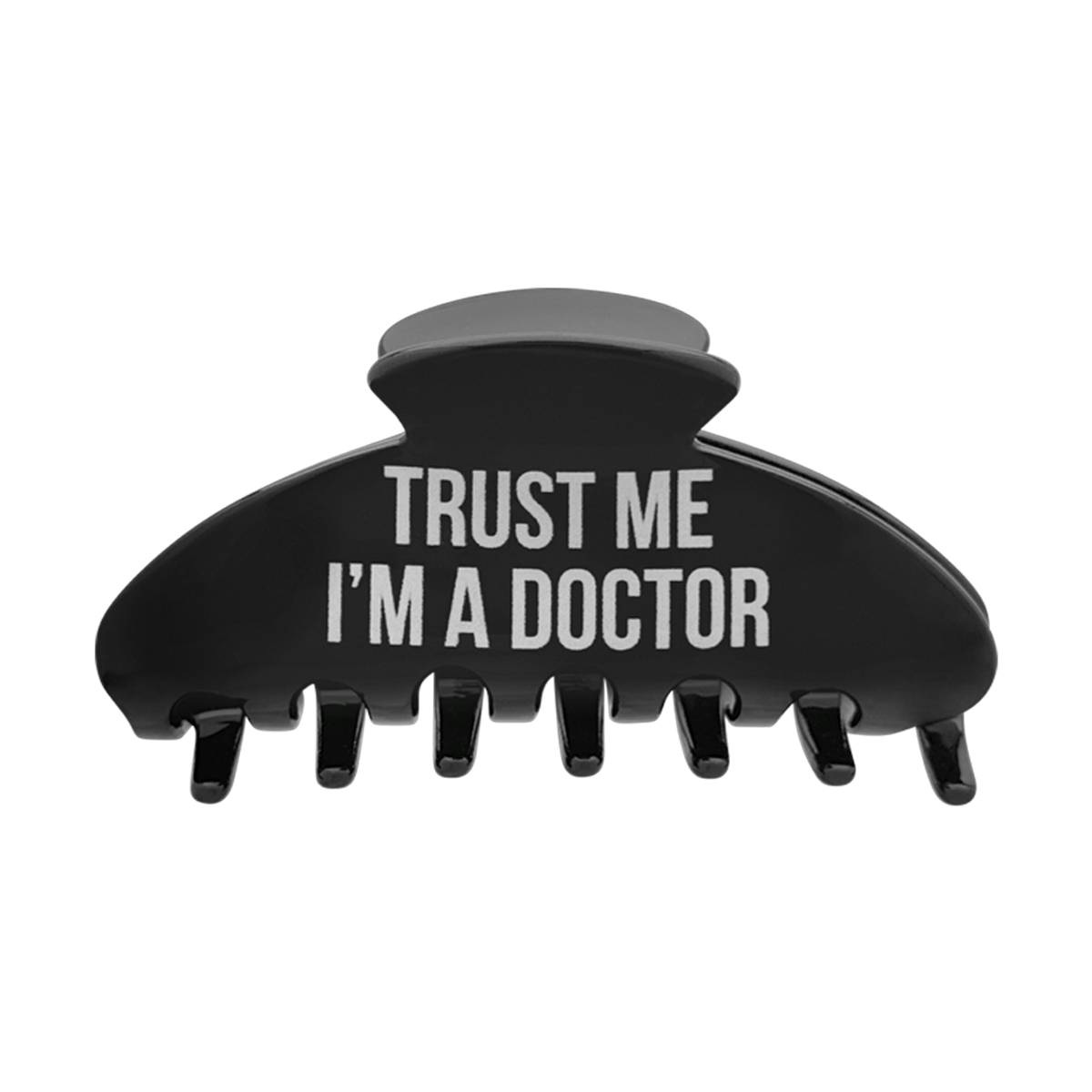 Front view of a black claw clip with “Trust Me I’m a Doctor” printed in white text.